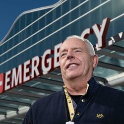 Dr. Stanford standing outside the Arkansas Children's Emergency department.