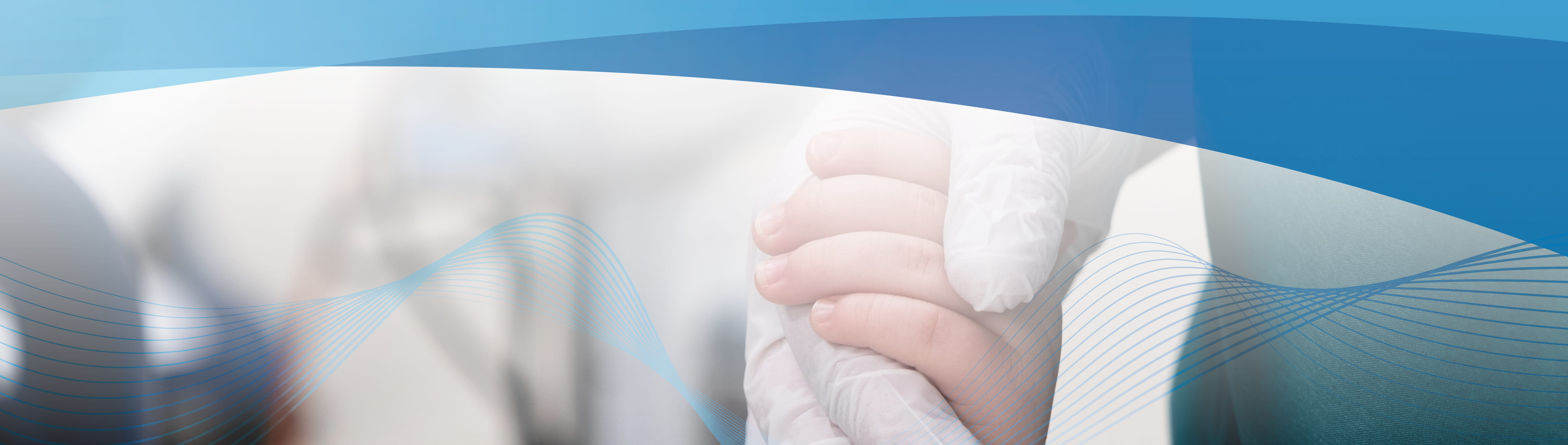 Provider holding hand of small patient. 