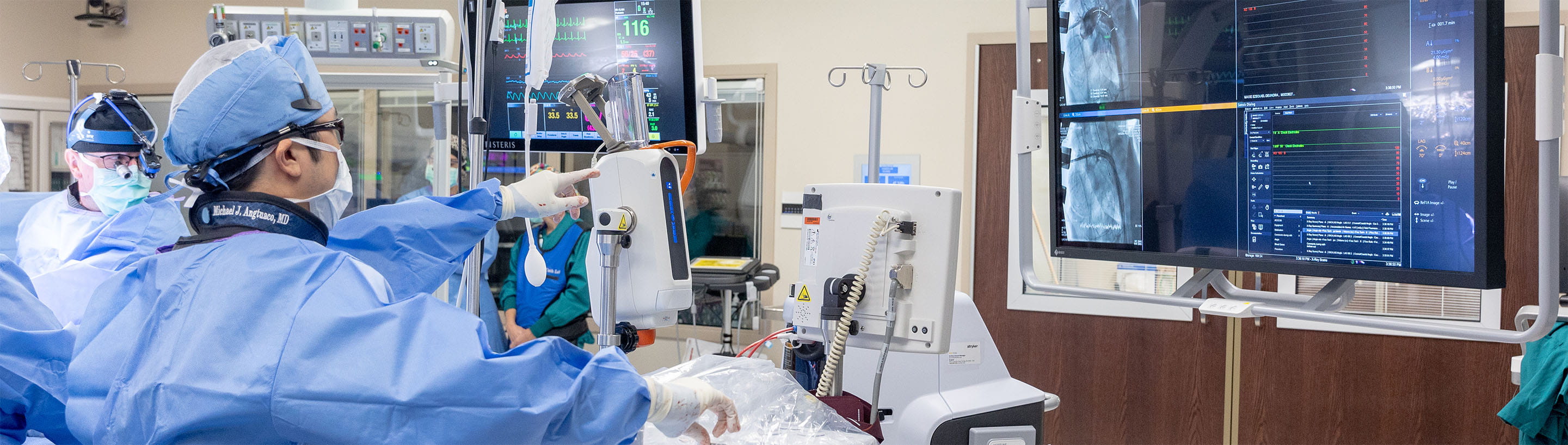 Cardiology surgeons in operating room.