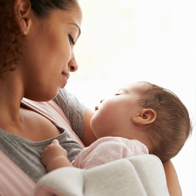 Mother holding baby in her arms