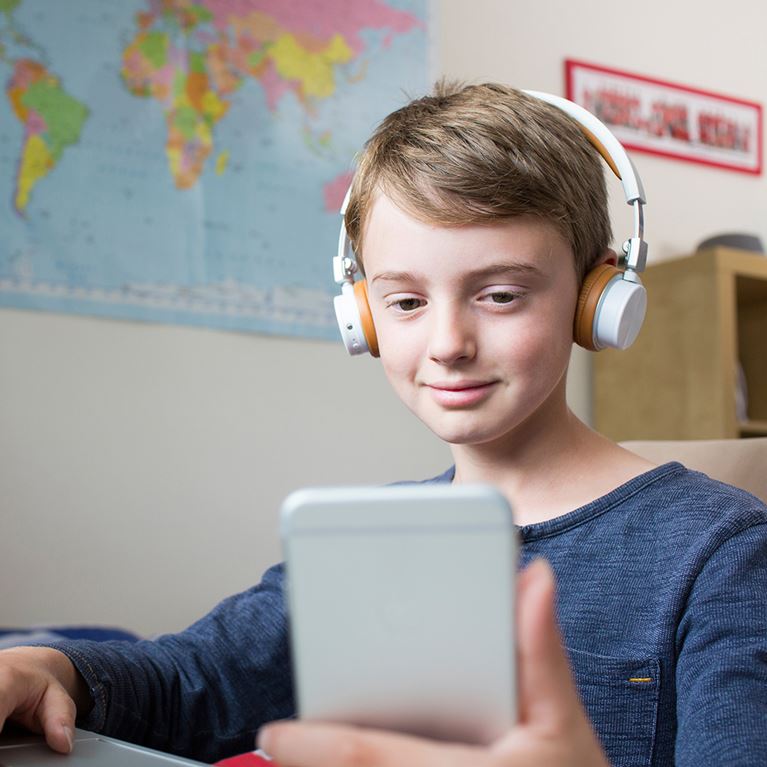 Boy looking at his phone