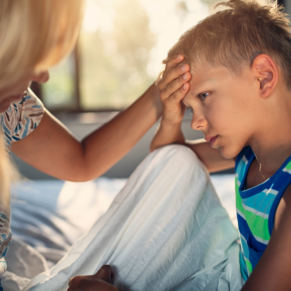 Boy with head pain.