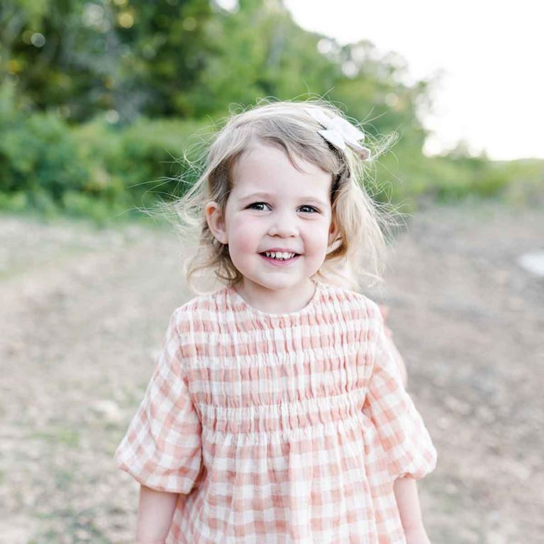 Elise Gammon - little girl smiling for photo