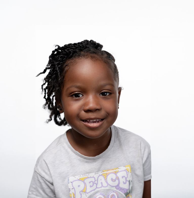 Photo of smiling patient wearing a tshirt.
