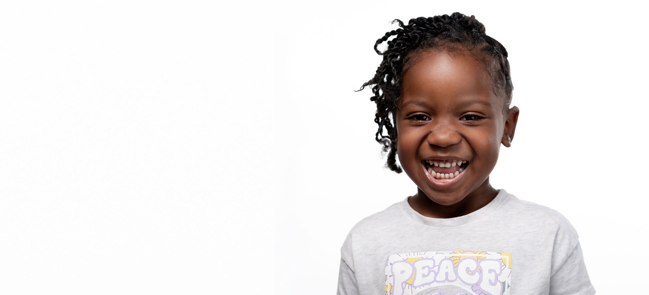 Photo of smiling patient wearing a tshirt.